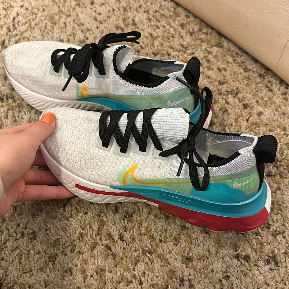 Nike React running sneaker/shoe size 7! White with hints of black, red, blue